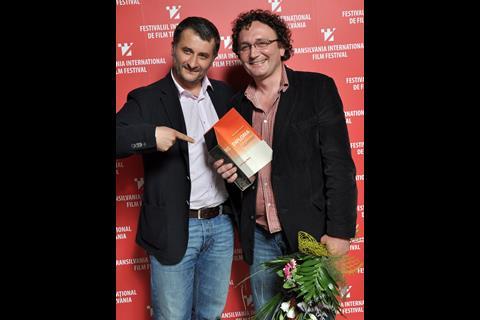 Director Cristi Puiu presented DoP Oleg Mutu with a Special Award on the occasion of TIFF's 10th anniversary